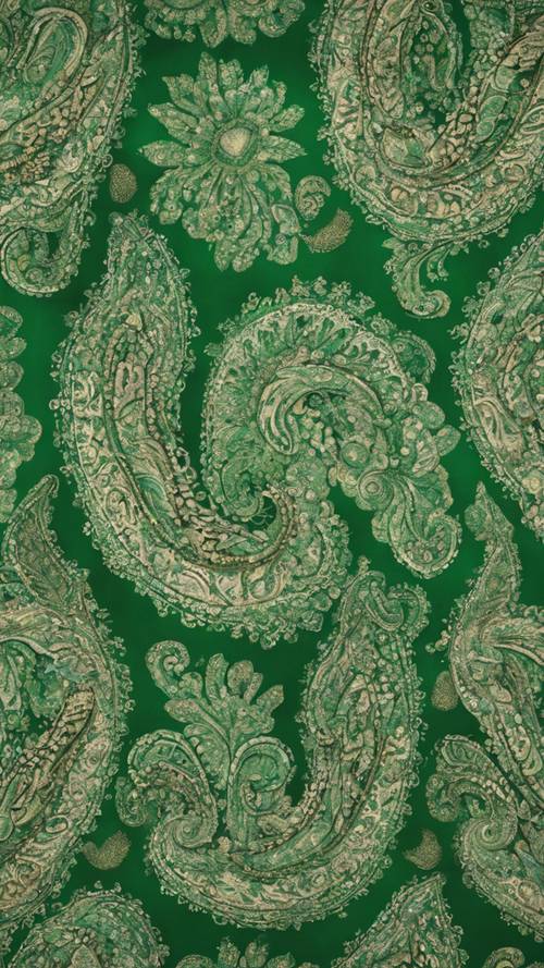 Green paisley patterns on a vintage silk scarf.