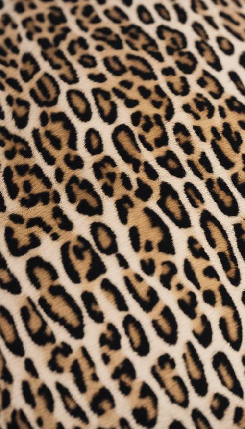 A close-up image of fabric showing a neutral-toned leopard print. Tapetai [2799b1f78c4e46148bc4]