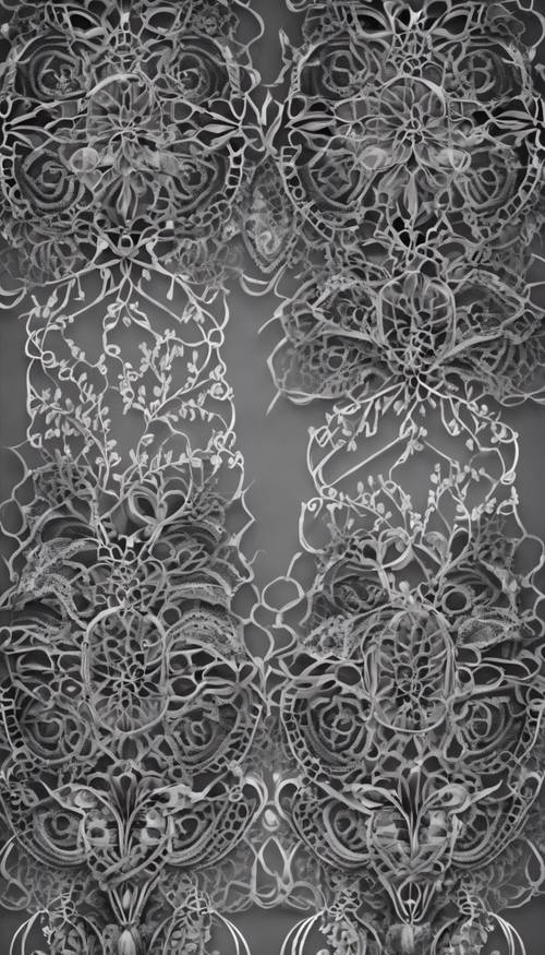 An ornamental black and gray pattern that resembles delicate lace.