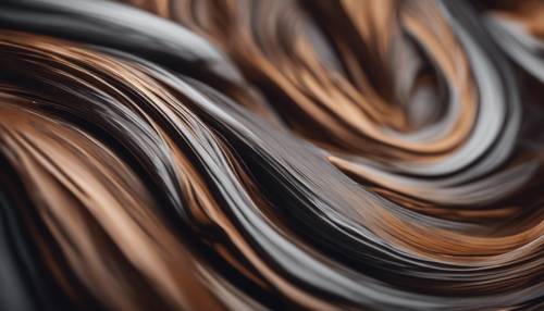 Абстрактное изображение переливающихся коричневых и серых оттенков, вызывающее ощущение тепла и тайны.