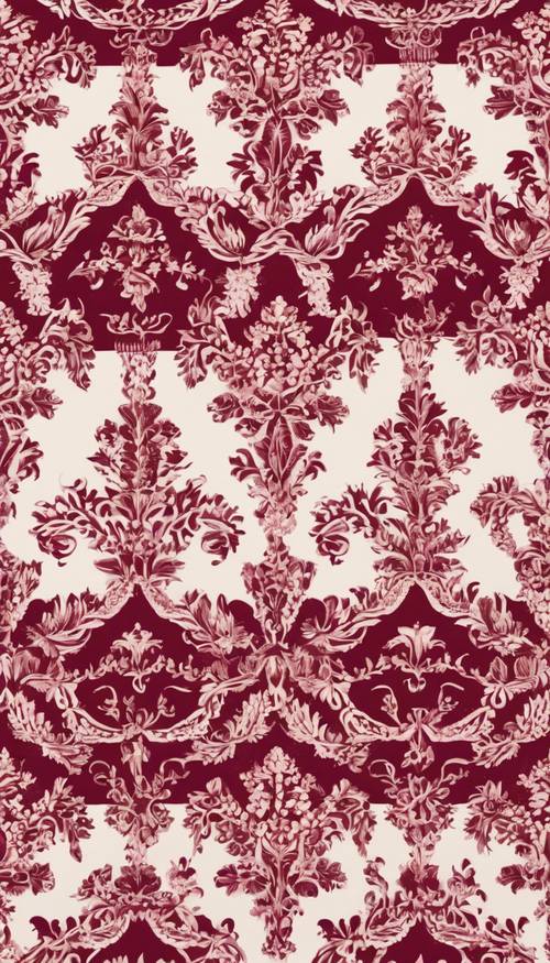 An intricately woven burgundy damask tablecloth.