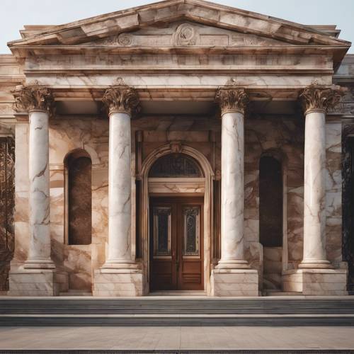 Um edifício neoclássico com grandes pilares de mármore marrom na entrada.