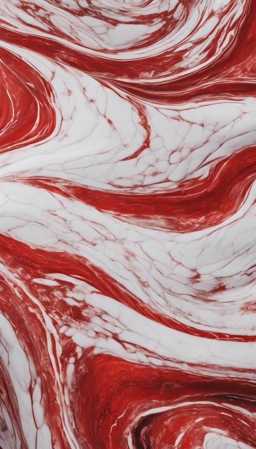 Ein wellenartiges Muster aus kurvenreichen roten und weißen Marmorstreifen.