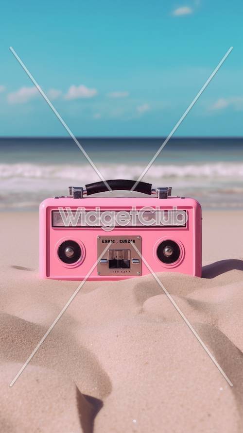 Radio rose sur la plage de sable