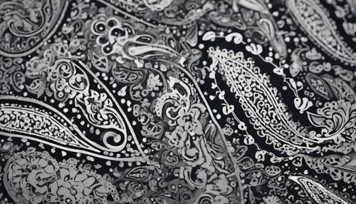 Classic paisley pattern fallen into shadow, comprised of ash-grey and cold steel tones.