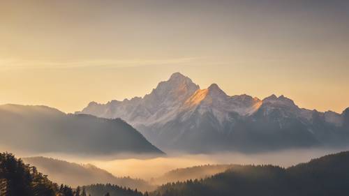 Un sommet de montagne serein embrassé par le soleil doré du matin, une citation inspirante écrite dans la brume matinale.