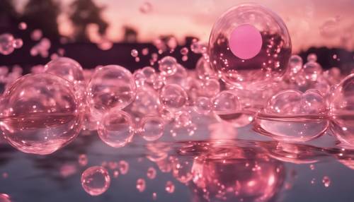 A magical evening sky filled with drifting pink bubbles reflected in a tranquil pond.