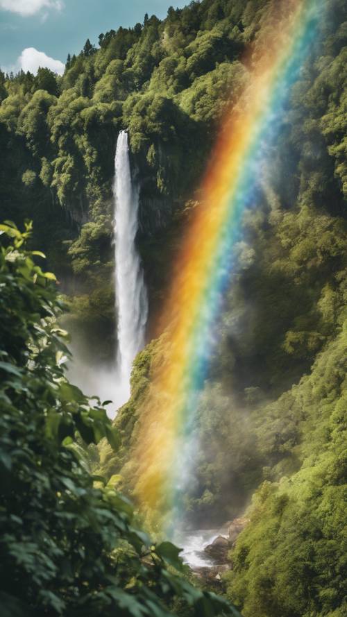 Closeup of a rainbow appearing from the spray of a majestic waterfall, surrounded by greenery.