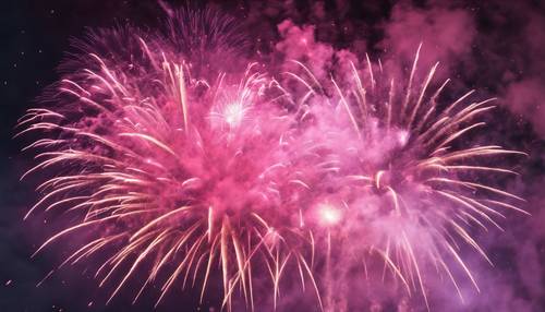 Show de fogos de artifício coloridos, com uma explosão de fumaça rosa subindo pelo céu noturno.