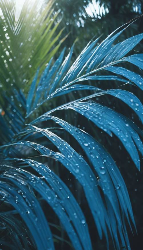 Energetic blue palm leaves in the monsoon rain.