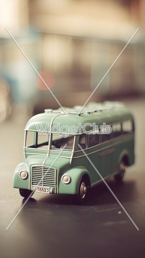 Vintage Green Toy Bus on a Blurry Background Wallpaper[9406a3d2dc4a4f7d8104]
