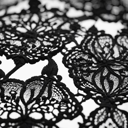 Black lace pattern reflecting an appreciation for detailed handiwork. Tapeta [8912d4bf79f14a9f99ca]