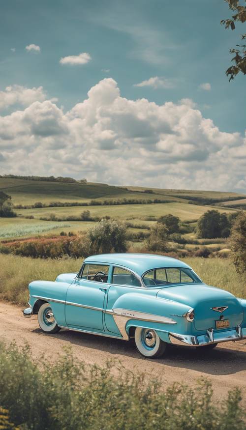 Une Chevrolet bleu ciel vintage des années 1950 sur une route de campagne.