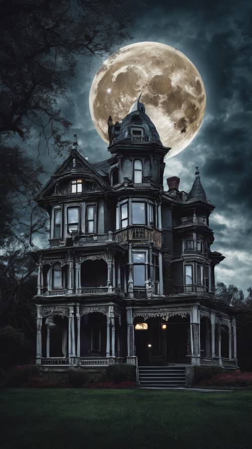 검은 구름과 보름달이 떠 있는 밤하늘 아래 유령이 나오는 빅토리아 시대 저택입니다.