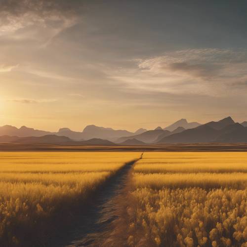 Dataran kuning yang tenang dan tenteram dengan pegunungan di cakrawala saat matahari terbenam.