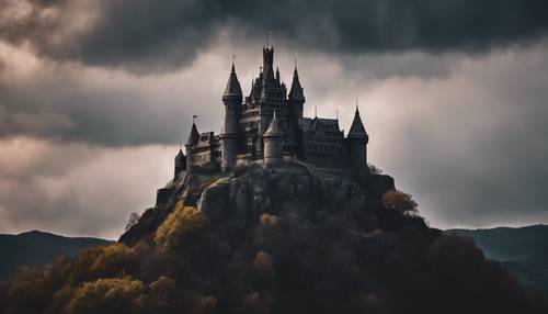 Emoji of an enigmatic dark castle perched atop a black hill.