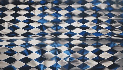 A checkered pattern in varying shades of dark blues and blacks.