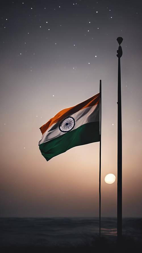 Indian flag illuminated by moonlight on a quiet night.