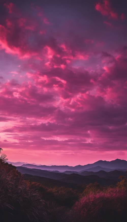 Một cảnh hoàng hôn rực hồng trên dãy núi đen, dưới bầu trời chiều rộng lớn, tạo nên một khung cảnh thanh bình yên bình.