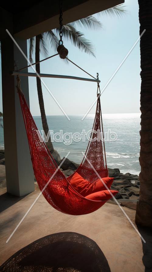 海边的红色吊床让人放松