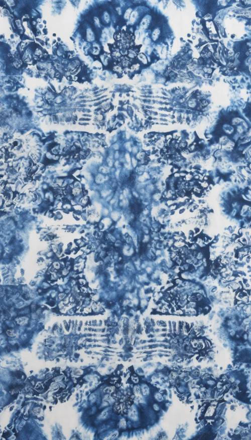 A blue tie-dye bandana laid flat on a white surface. Tapet [d5dd542a69674c6e9707]