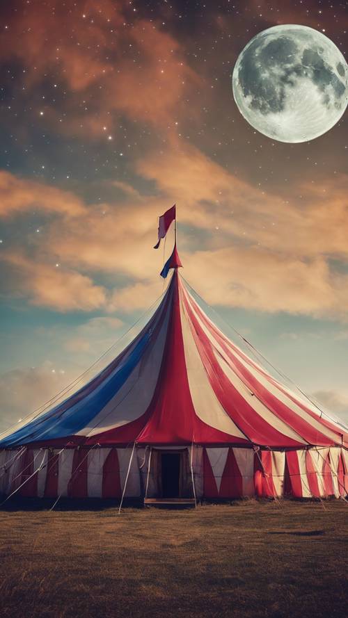 Tenda sirkus besar berwarna-warni bersinar di bawah langit yang diterangi cahaya bulan.