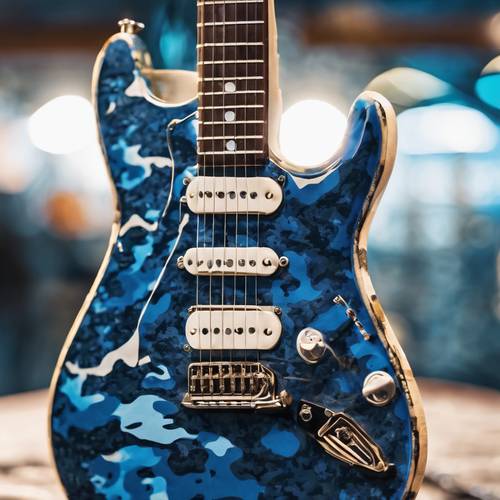 Nahaufnahme einer E-Gitarre mit einer einzigartigen blauen Tarnlackierung.