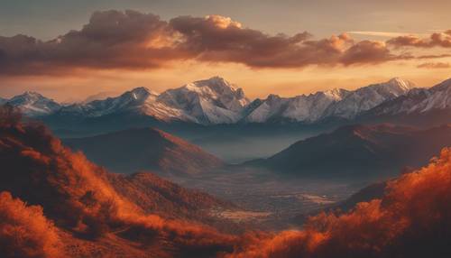 A serene mountain range valley bathed in the warm orange glow of sunset.