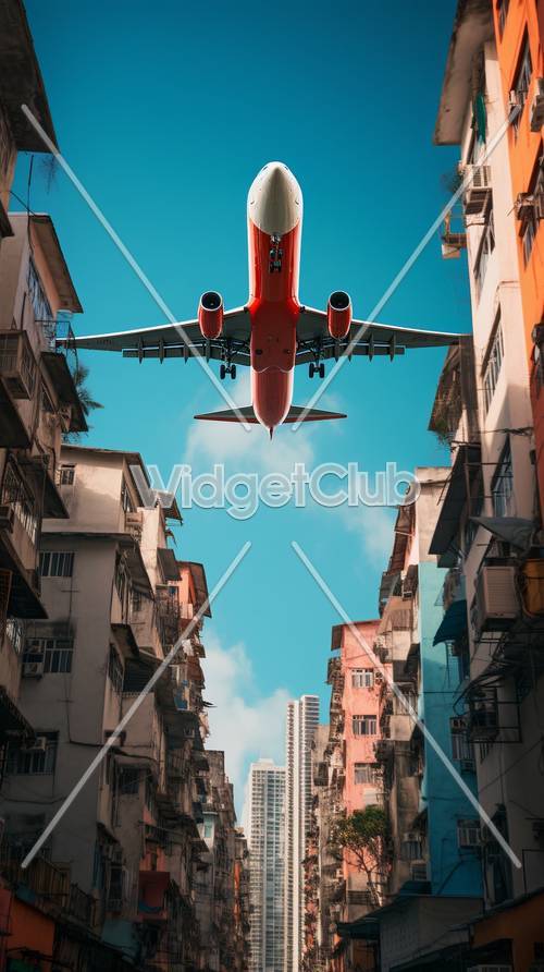 Airplane Flying Low Between Colorful Buildings