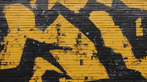 Audace arte di strada su un muro di mattoni pieno di disegni astratti neri e gialli.