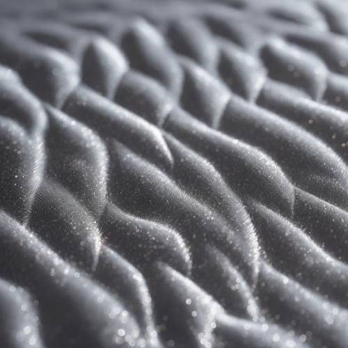 Shimmering effect on silver grey velvet forming an elegant pattern.