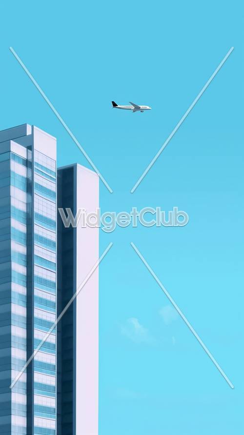Edificio e aereo sullo sfondo del cielo