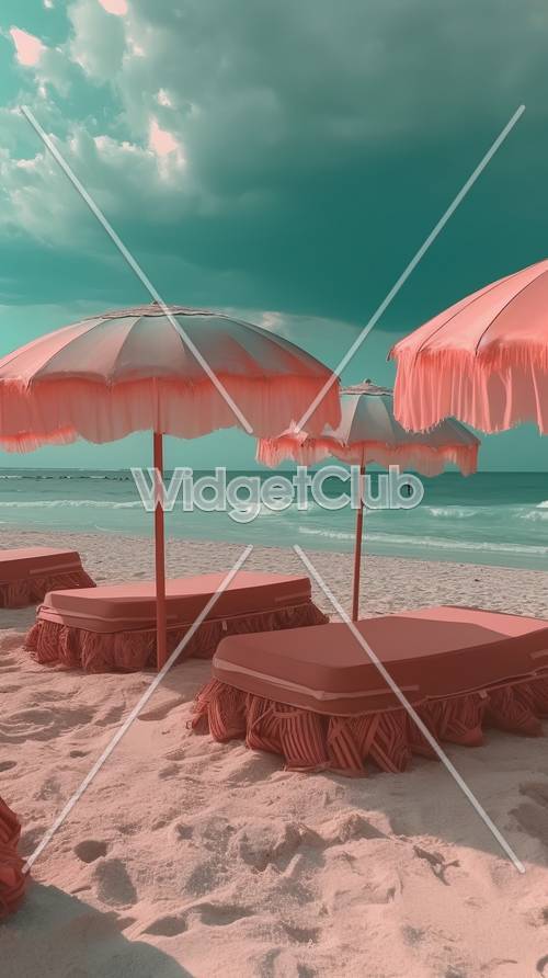 Rosa Sonnenschirme und Liegestühle am Meer