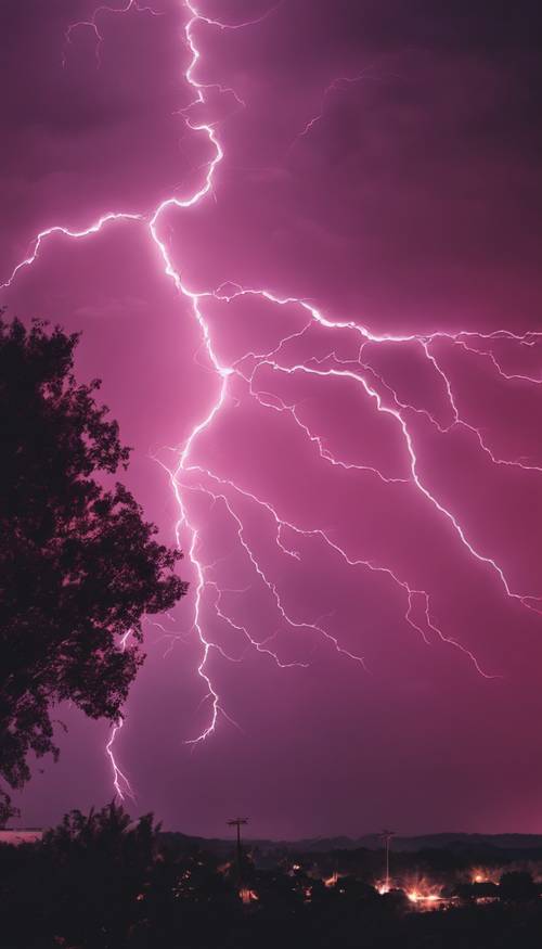 A vibrant pink lightning bolt streaking across a midnight sky Tapeta [9eb4bad9afe8427f866c]
