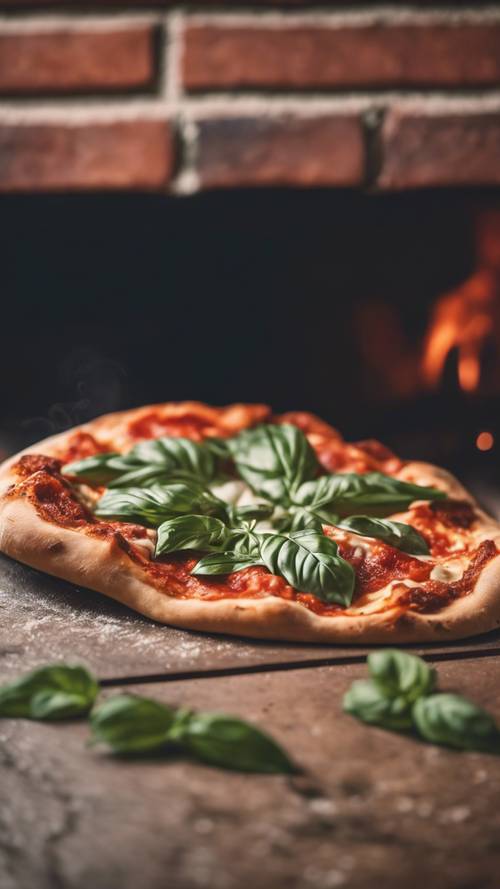 A classic Neapolitan pizza with whole basil leaves being baked in an antique brick oven.
