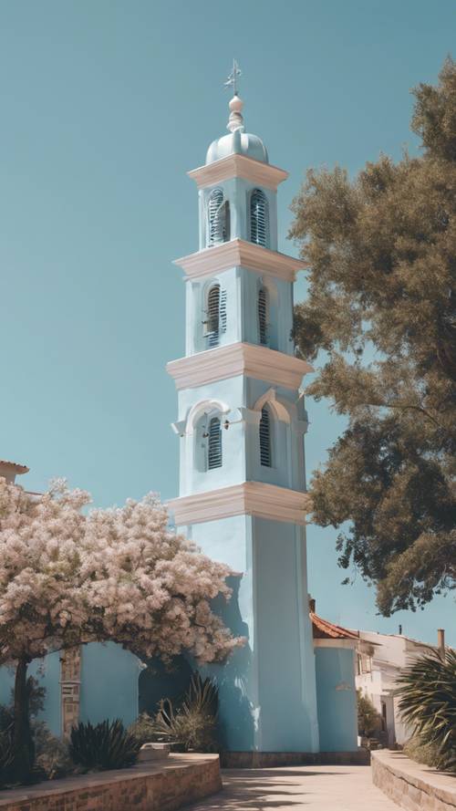 Tháp chuông màu xanh nhạt trang nghiêm trên nền trời trong xanh đầy nắng ở một thị trấn ven biển.