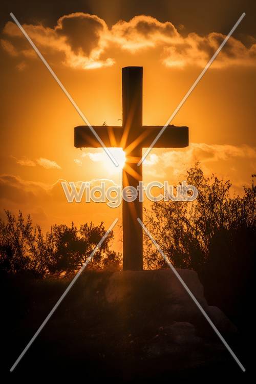 Pôr do sol deslumbrante atrás de uma cruz