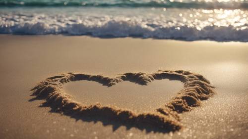 A heart drawn in the sand being washed away by ocean waves. Tapet [12bab711a69a4c6e95f9]