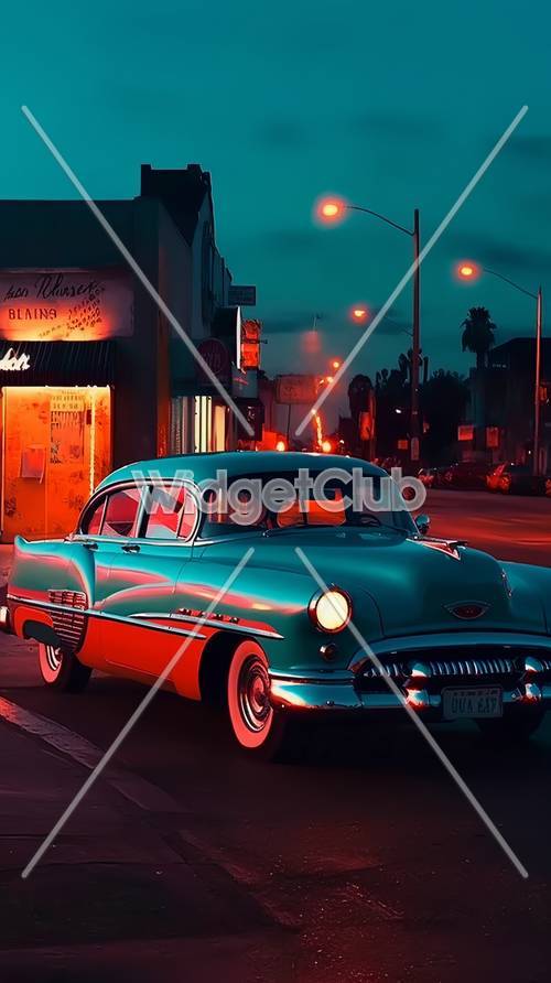 Mobil Vintage Berwarna-warni di Jalan yang Diterangi Neon