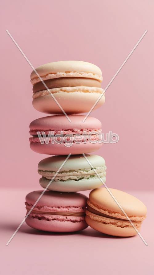 Colorful Macarons Stack on Pink Background