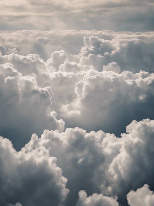 Uma imagem de uma citação branca pensativa aparecendo em uma formação de nuvens.