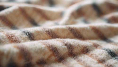 A soft cream-colored plaid pattern on a wool blanket Tapet [d3b7192177a74528b194]