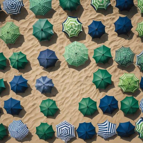 Aligned rows of navy blue and green umbrellas seen from above on a sandy beach during summer.