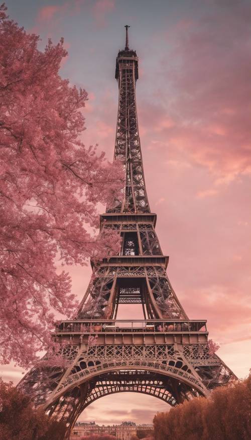 A warm Parisian sunset casting a pink hue on the Eiffel Tower.