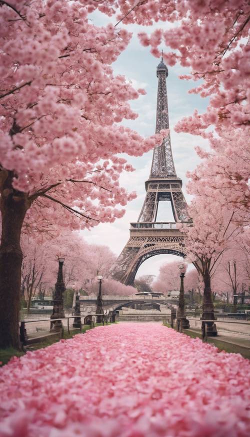 Una Torre Eiffel a tema fiori di ciliegio circondata da petali rosa.