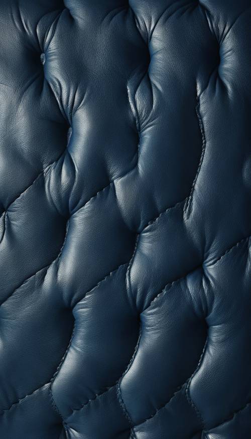 Close-up de uma textura de couro azul escuro macio e amanteigado.