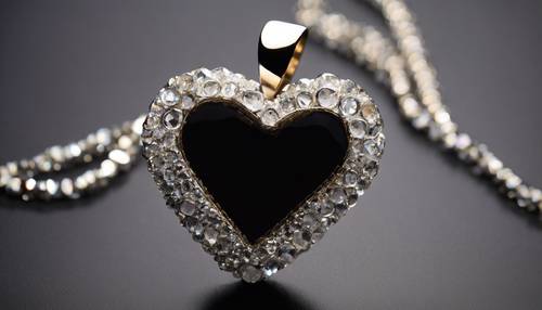 An elegant half heart pendant made of crystals, shining brightly against a simple black background.