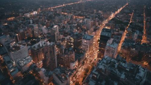 A September bird's eye view of a bustling city at dusk