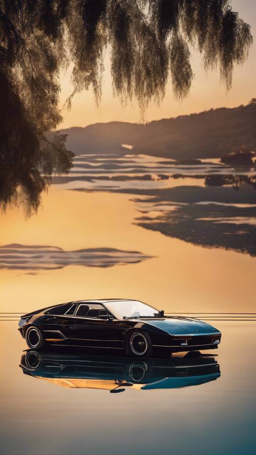 一輛時尚的黑色跑車威嚴地停在金色的夕陽下，倒映在波光粼粼的藍色湖水中。