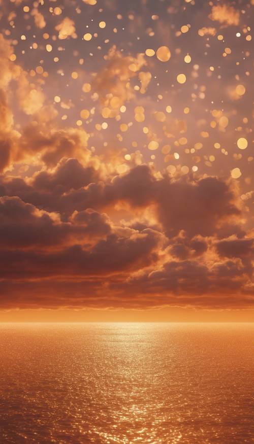 Un vivido cielo al tramonto che forma pois dorati naturali tra nuvole color arancione.